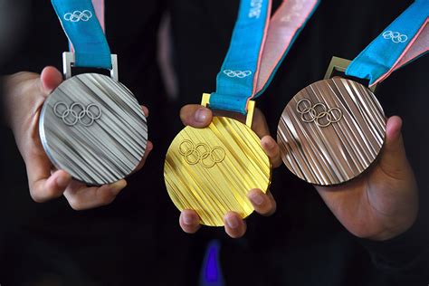 What Are Olympic Medals Actually Made Of Trophies Plus Medals