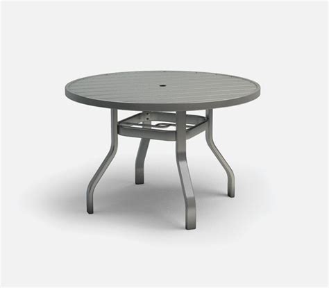 The hole in the middle is for attaching a large umbrella so you can enjoy shade throughout the day. Homecrest Breeze 42" Round Dining Table with Umbrella Hole ...