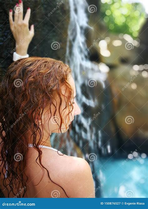 The Girl At The Waterfall Beautiful Woman Enjoying Bathing Near Natural Waterfall Stock Image