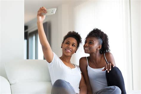 African American Teenage Girls Taking A Selfie Picture With A Sm Stock Image Image Of Face
