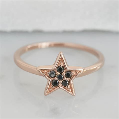 Rose Gold Star Ring With Black Stones By Muru