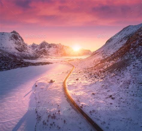 Beautiful Road In Snowy Mountains In Winter At Sunset Stock Photo By