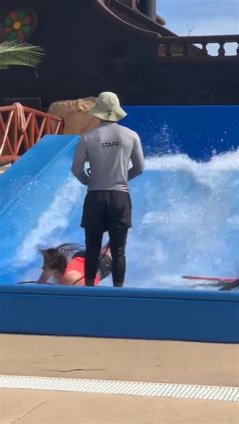Girl Smacks Her Head After Getting Wiped Out On Surf Simulator Jukin