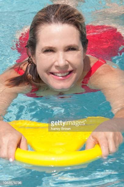 Older Woman Pool Float Photos And Premium High Res Pictures Getty Images