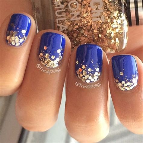 Ombre has been a hit in the past few years, although it hasn't been even a thing before 2005. Blue And Gold Glitter Ombre Nails