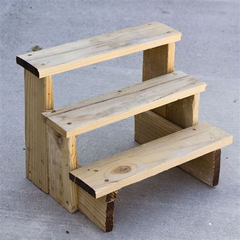 We've been busy finishing up our landscaping for our home. Plant Riser Step 4: | Diy plant stand, Plant stands ...