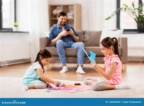 Happy Sisters Doing Arts And Crafts At Home Stock Photo Image Of