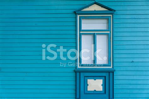 Blue Side Elevation Of Old Wooden House With Window Stock Photo