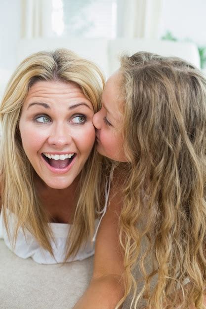 Premium Photo Daughter Kissing Her Mother