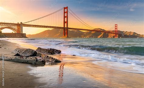 Sunset At The Beach By The Golden Gate Bridge In San Francisco