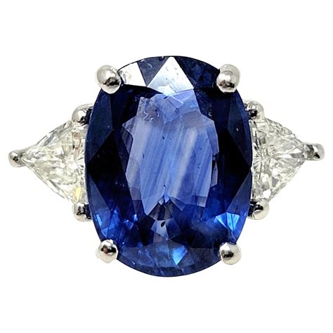 Gia Certified Oval Cut Blue Sapphire And Trillion Cut Diamond 3 Stone