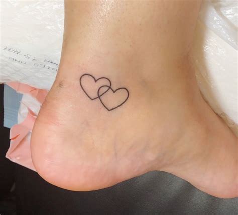 small heart tattoo on ankle