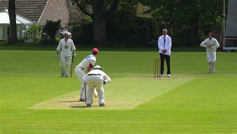 United Kingdom Circa 2015 The Sport Of Cricket Is Played On A Green