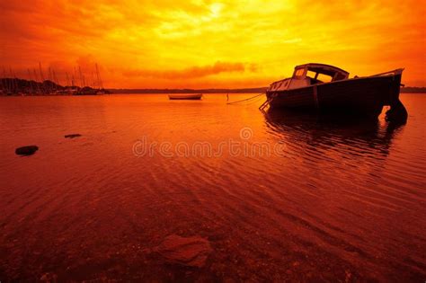 Small Boat And Sunset In Denmark Stock Photo Image Of Dawn Calm