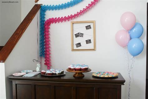 Gender reveal party ideas include handing out props, playing fun games, taking votes on the gender and baking delicious treats with the the outdoors is a great place to do a balloon gender reveal box and the beach, with serene waves and a gorgeous sunset, lends itself perfectly to a photoshoot. Gender Reveal Party Inspiration - A Savory Feast