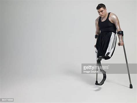 Amputee Crutch Stock Photos And Pictures Getty Images