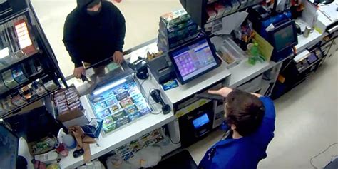 Hatchet Wielding Thief Backs Down When Store Clerk Pulls Out Gun But