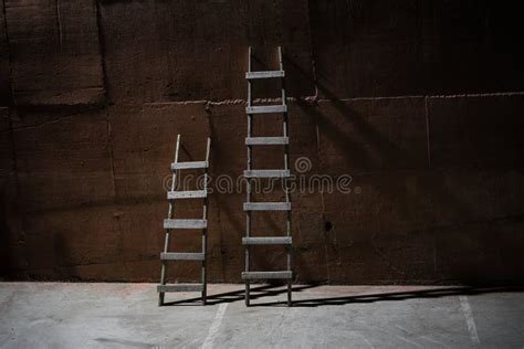 Two Ladders On Brown Wall Stock Image Image Of Line 247480481