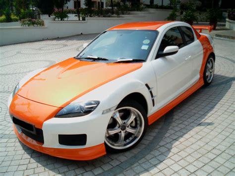 The car had been stored in a garage for decades until the owner decided to sell the car finally. Orange White-Chocolate Paint Job! - RX8Club.com