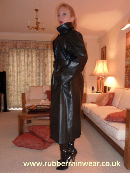 This Beautiful Babe Is Showing Off Her Long And Luxurious Rubber Rainwear Rain Wear Rubber