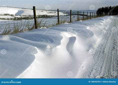 A Snow Drift At The Side Of The Road Stock Image Image Of Wire