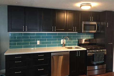 However, the overall appearance is a vibrant turquoise color. Hometalk | Turquoise Subway Tile Backsplash