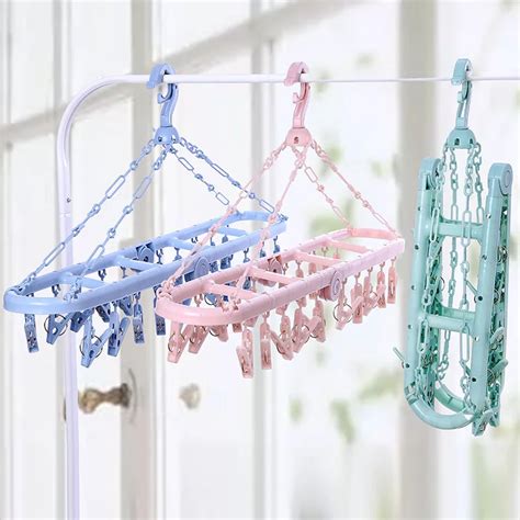 1pc Multifunction Plastic Windproof Clothes Hanger Foldable Drying Rack With Peg For Socks
