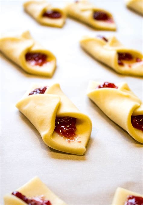 They remind me of a miniature pie in flavor and looks. Raspberry Bow Tie Cookies | Recipe | Bow tie cookies, Best holiday cookies, Holiday cookies