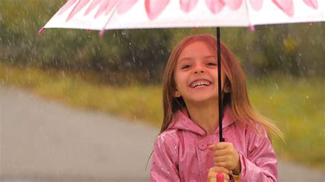 Smiling Girl With Umbrella Under Rain Stock Video Footage 0022 Sbv