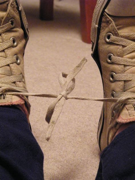True Tall Taiko Tales Shoelaces Tied Together