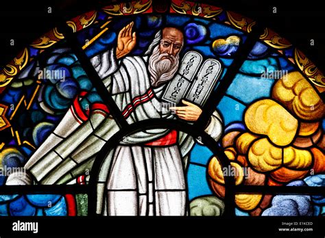 Stained Glass Window Depicting Moses Holding The Commandments Holy