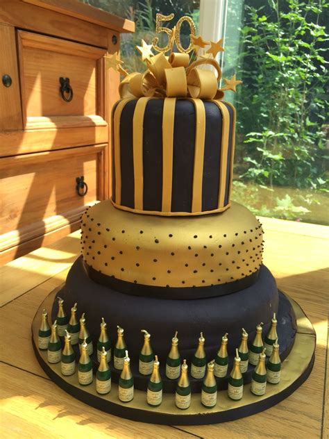 If you have a room full of men coming to your 50th birthday party, chances are a floral theme wouldn't go over well! 50th birthday cake celebration for black and gold theme ...