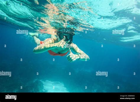 Woman Swimming In Azure Blue Hi Res Stock Photography And Images Alamy