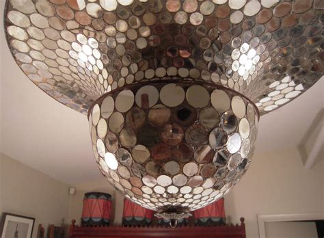 It is not only about the color, materials, shapes, and forms; Mirrored "disco" chandelier - I wonder if I could make one ...