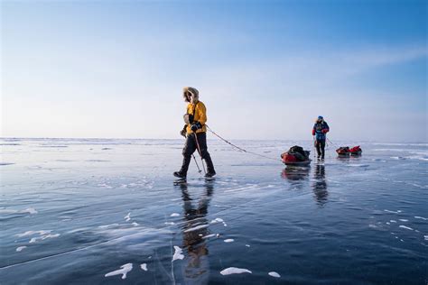 Sledders Begin Hauling Across Lake Baikal