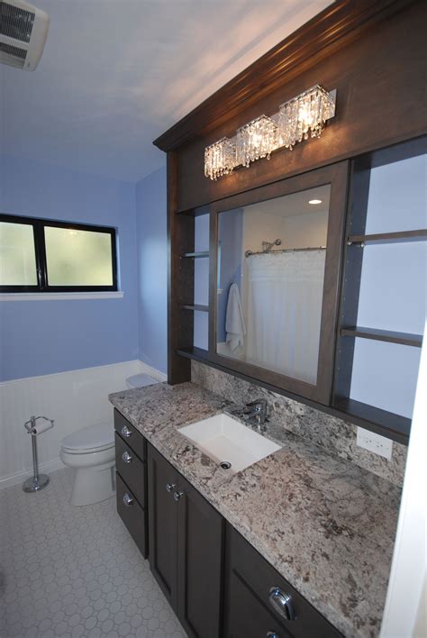 The bathroom cabinets are flawless. StarMark cherry slate with sliding vanity mirror ...