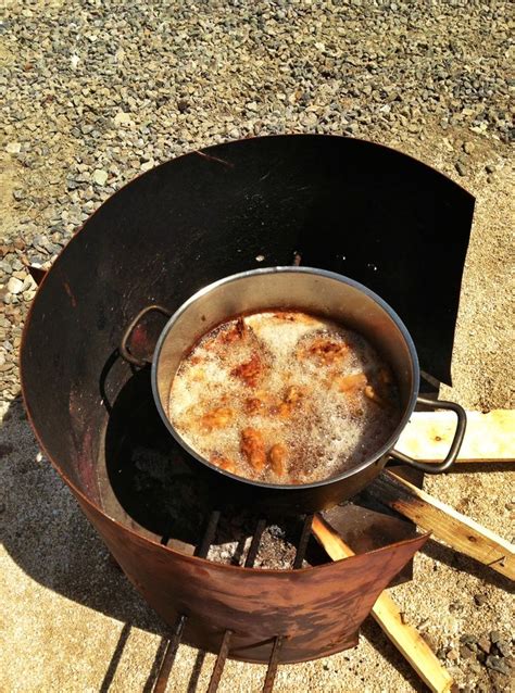 We did not find results for: Cooking fried chicken on a makeshift stove, open fire ...