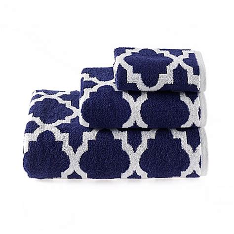 Also of note, the subtle addition of grey bath linens, rather than stark white towels. Buy Riviera Jacquard Bath Towel in Navy from Bed Bath & Beyond