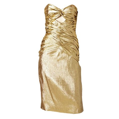 She was nominated in the best actress category. Vicky Tiel Gold Lame Strapless Cocktail Dress at 1stdibs