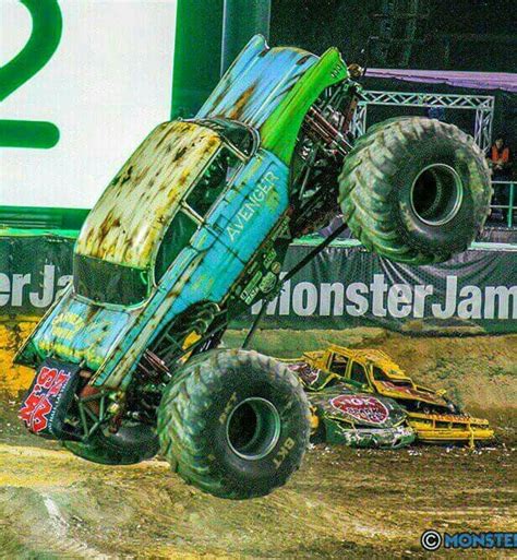 A Monster Truck That Is Jumping In The Air