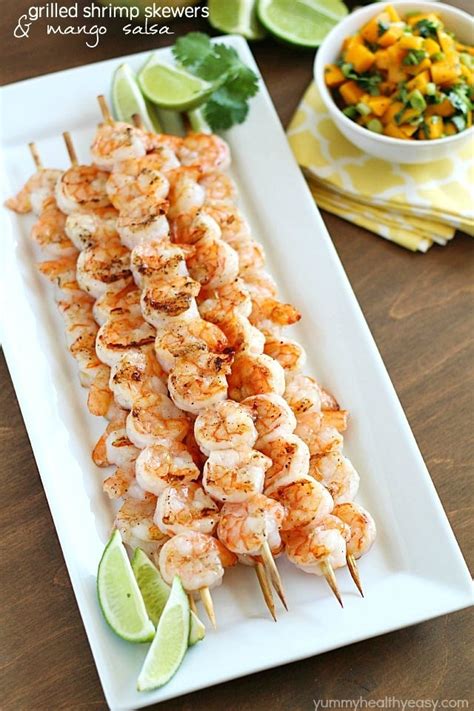 May 21, 2018 · these grilled shrimp skewers are shrimp marinated in garlic, lemon and herbs, then threaded onto sticks and cooked to perfection. Grilled Shrimp Skewers with Mango Salsa - Yummy Healthy Easy