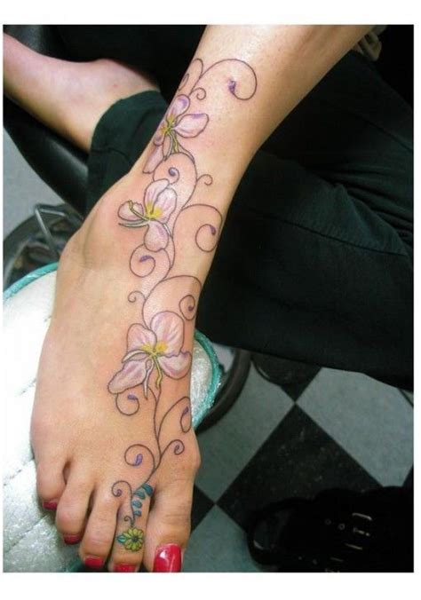 Flowers Tattoo On Ankle And Foot Foot Tattoos Ankle Tattoo Designs