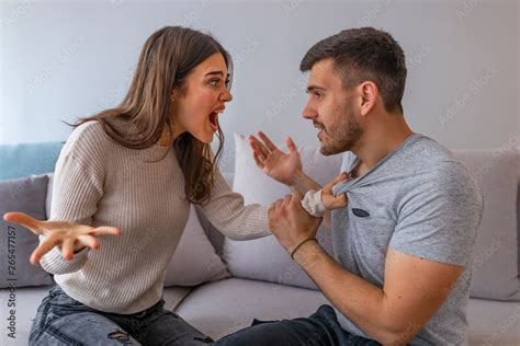 Furious Couple Arguing While Having Problems In Their Relationship