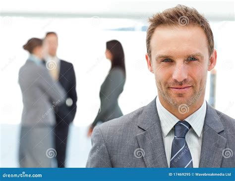 Proud Manager Posing In Front Of His Team Stock Image Image Of