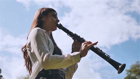 Girl Plays Clarinet Against Sky Youtube
