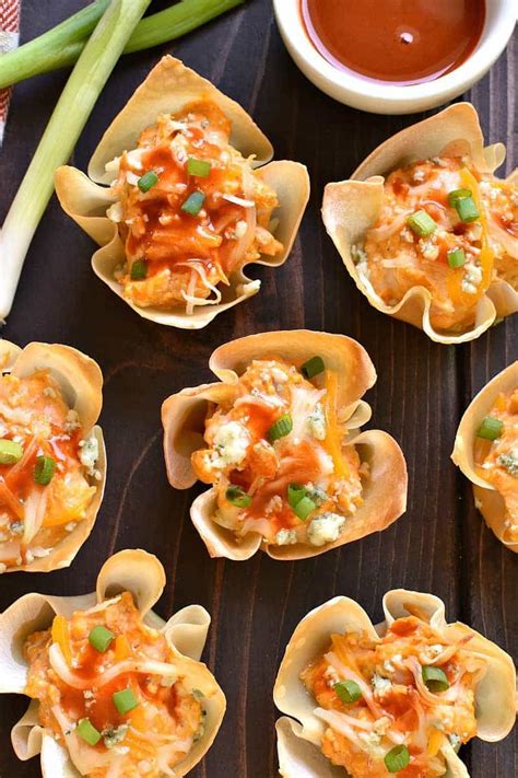Every bite is bursting with flavors. These Buffalo Chicken Wonton Cups are the PERFECT little ...