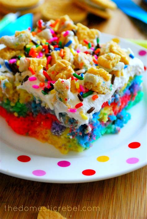 While i love my pistachio cake that's made in a bundt, this baking pan version is deliciously different. Better Than Presents… Rainbow Birthday Poke Cake | The Domestic Rebel