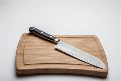 Free Photo Wooden Cutting Board With Knife Board Chop Cooking