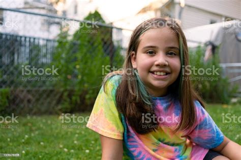 Portrait Of A Latin Girl Looking At The Camera Stock Photo Download