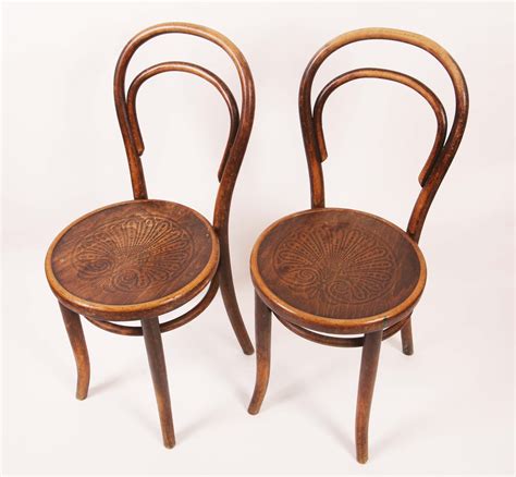 A Set Of Six Thonet Bentwood Chairs With Paper Labels Under Some